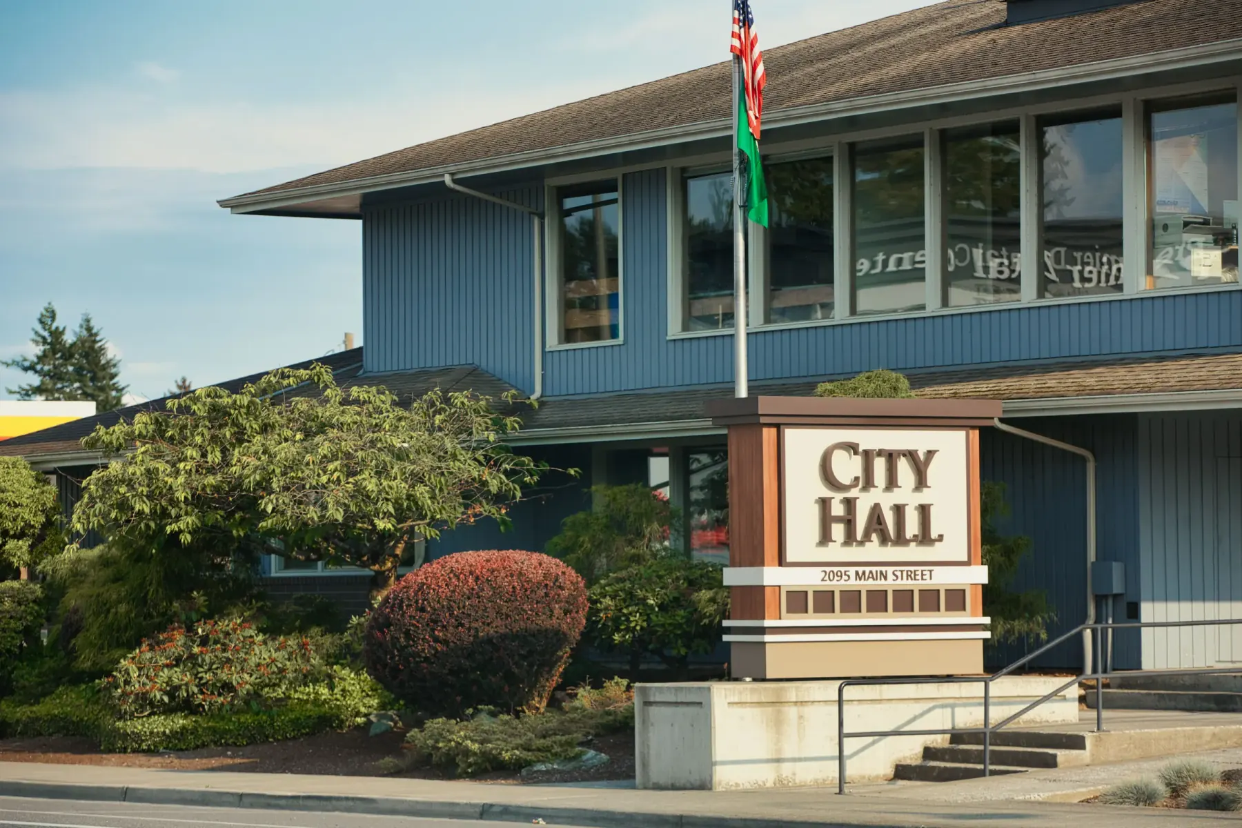 Small American city hall viewed from its front lawn